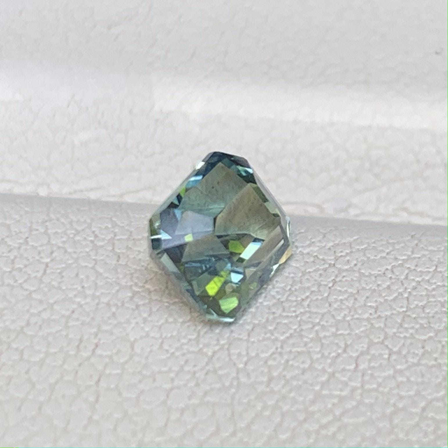 Bi Color Natural Teal Sapphire 1.52ct - (UH) - Baza Boutique
