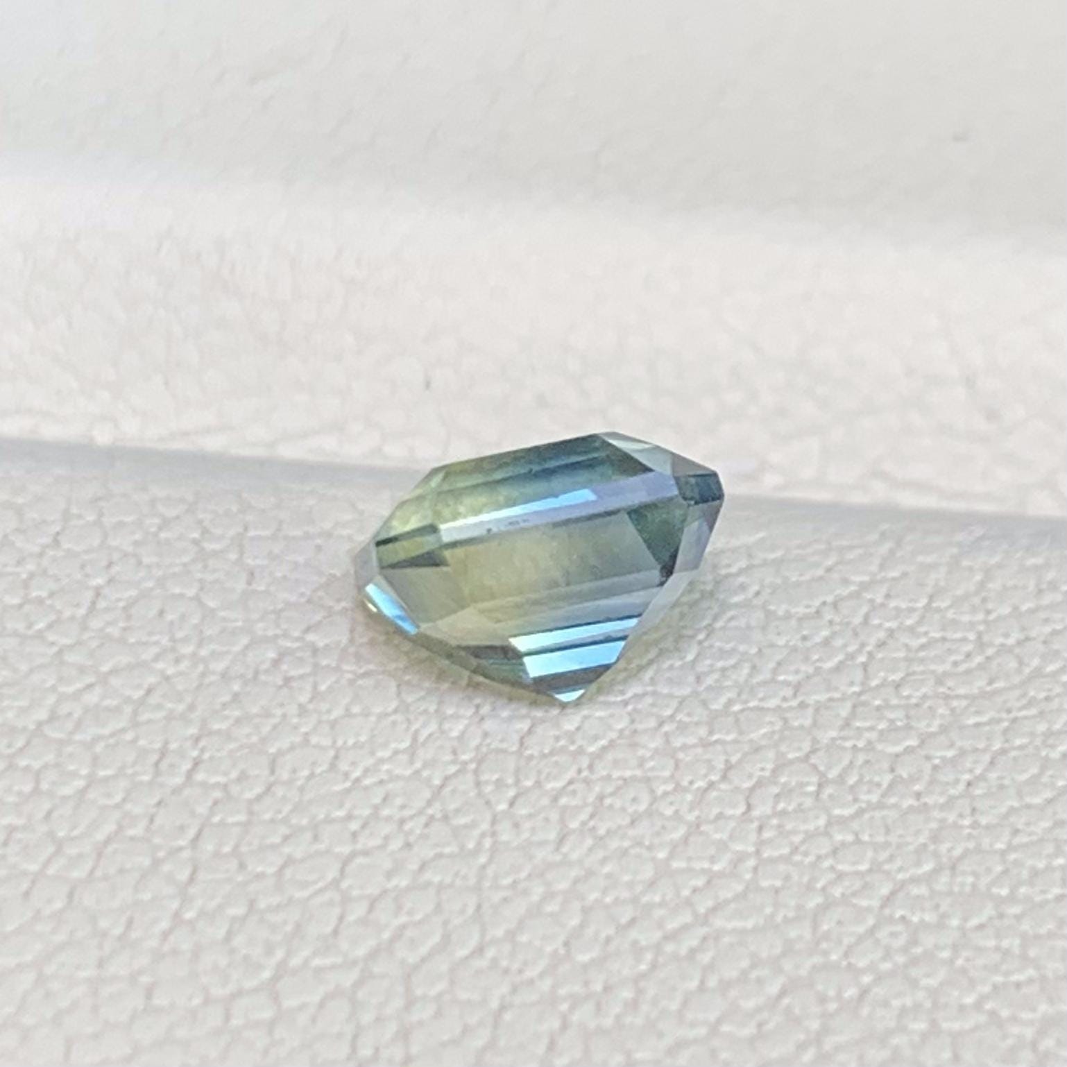 Bi Color Natural Teal Sapphire 1.52ct - (UH) - Baza Boutique