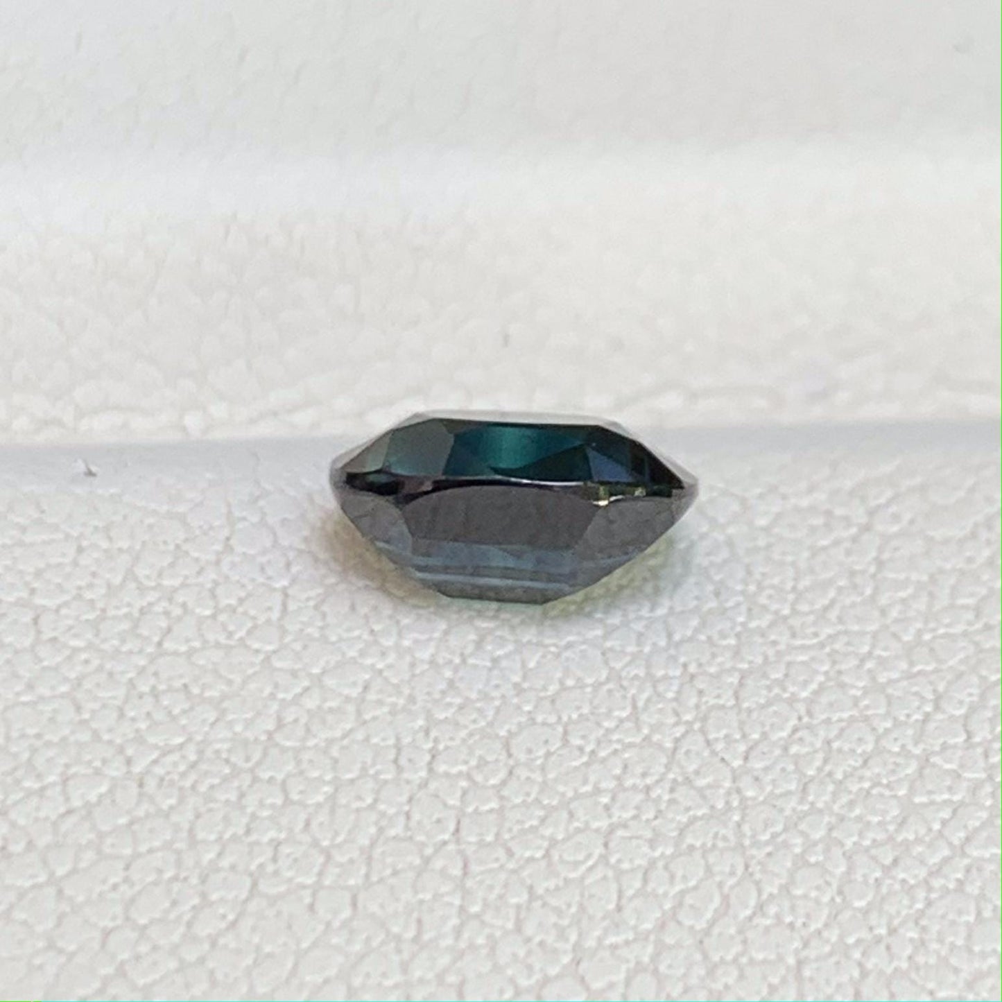 Natural Peacock Teal Sapphire 1.23ct - (UH)