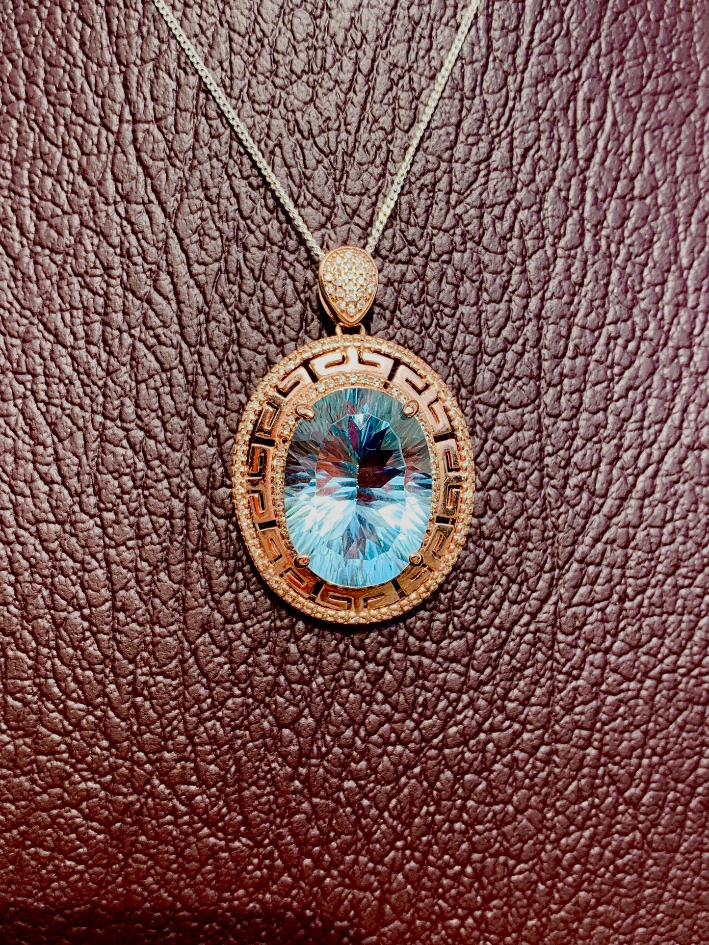 Handmade Laser-Cut Swiss Blue Topaz Pendant in Rose Gold Sterling Silver