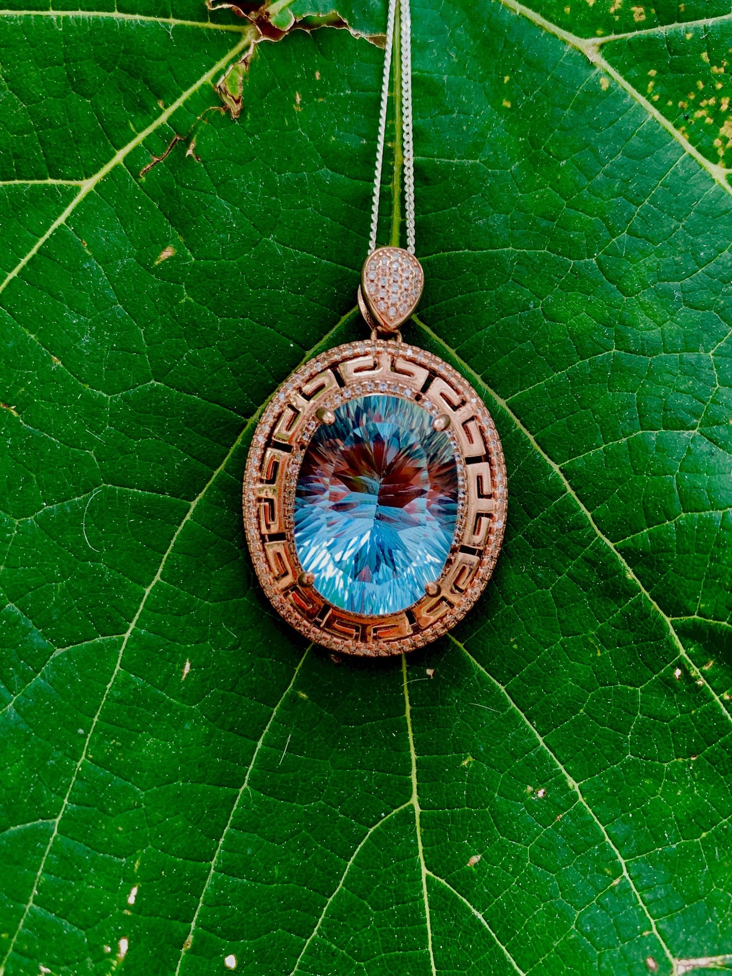 Handmade Laser-Cut Swiss Blue Topaz Pendant in Rose Gold Sterling Silver