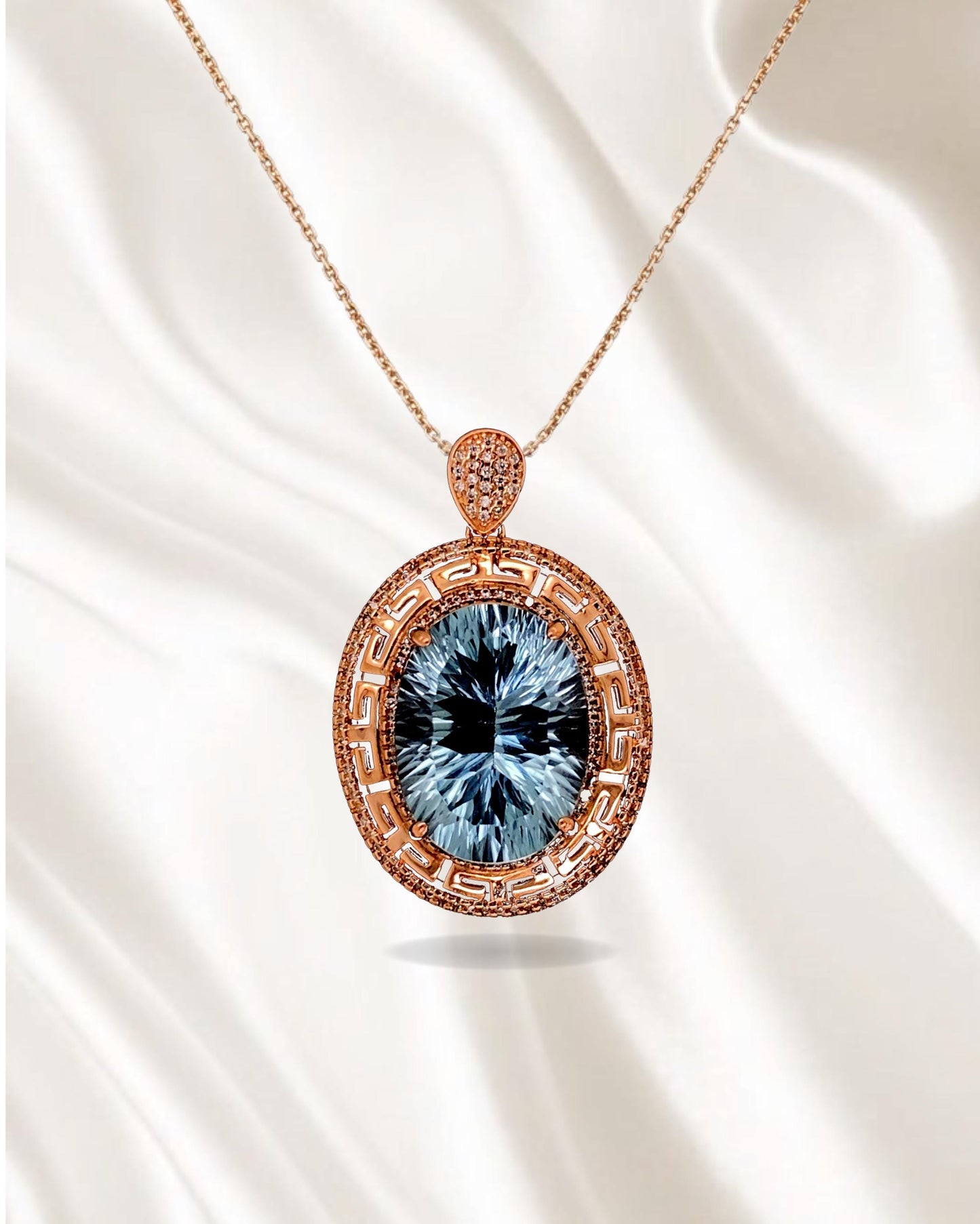 Handmade Laser-Cut Swiss Blue Topaz Pendant in Rose Gold Sterling Silver